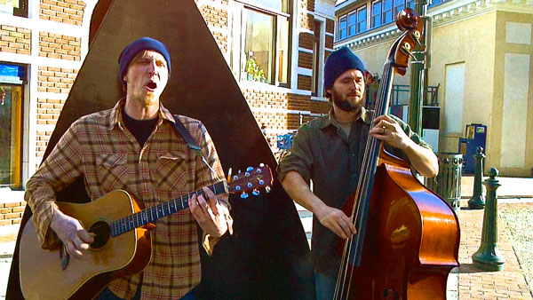 Busk Break: The Asheville Waits Band covers “Singapore”